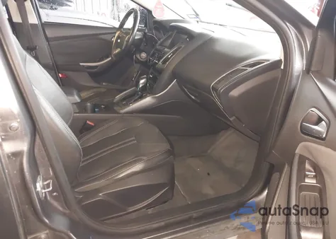 2013 Ford Focus Titanium z USA, uszkodzony, nr VIN 1FADP3J20DL189239